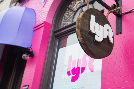 pink lyft logo and sign