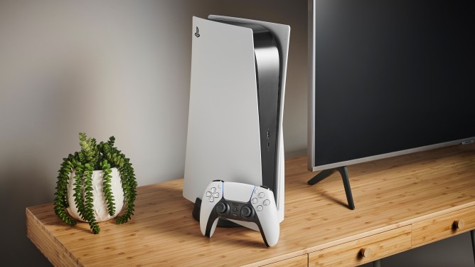 Sony PlayStation 5 home video game console and DualSense controller alongside a television