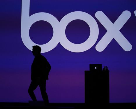 The silhouette of Aaron Levie, chief executive officer and co-founder of Box Inc., is seen on stage during the BoxWorks 2016 Conference at the Moscone Center in San Francisco, California, U.S., on Wednesday, Sept. 7, 2016. Box Inc., trying to expand revenue amid slower billings growth, will unveil new software developed with IBM to help companies set up and manage document-heavy workflows like recruiting, budgeting, sales and customer management. Photographer: Tony Avelar/Bloomberg via Getty Images
