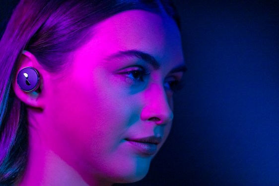 woman wearing earbuds