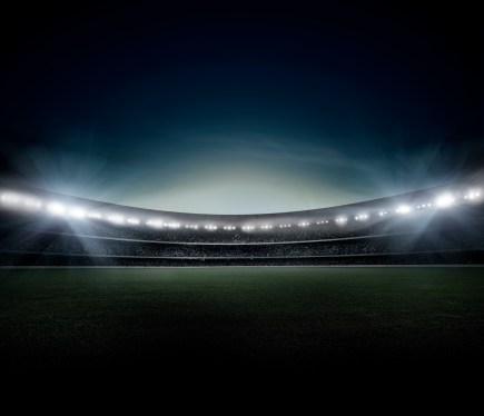 An image of a sports stadium at night