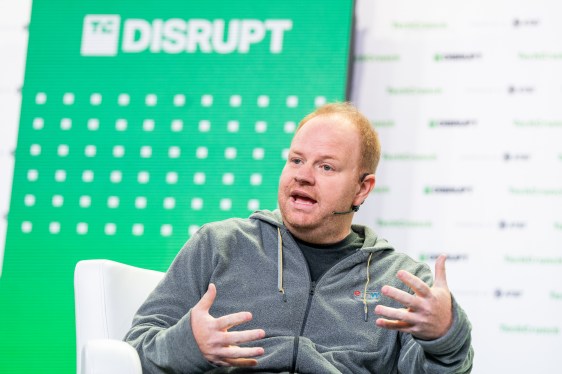 Parker Conrad, CEO at Rippling talks with Mary Ann Azevedo talk about "Going Global" at TechCrunch Disrupt in San Francisco on October 20, 2022. Image Credit: Haje Kamps / TechCrunch