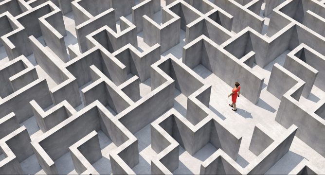 Businesswoman in a full frame complex maze