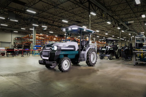 Monarch Tractor's robot tractor in a warehouse