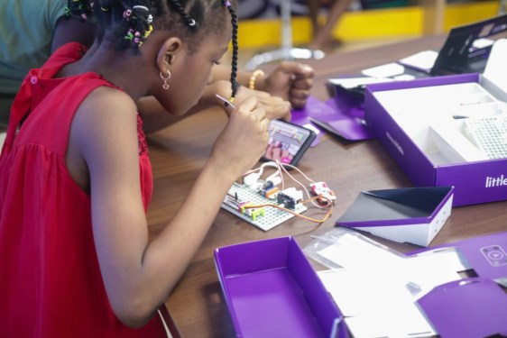 young girl working on a STEM project