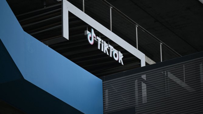 The TikTok logo is displayed outside TikTok social media app company offices in Culver City, California, on March 16, 2023. - China urged the United States to stop "unreasonably suppressing" TikTok on March 16, 2023, after Washington gave the popular video-sharing app an ultimatum to part ways with its Chinese owners or face a nationwide ban. (Photo by PATRICK T. FALLON/AFP via Getty Images)