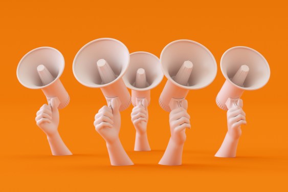 3d rendering of megaphone. Man is holding megaphone in his hand. Advertisement, sale, announcement message.