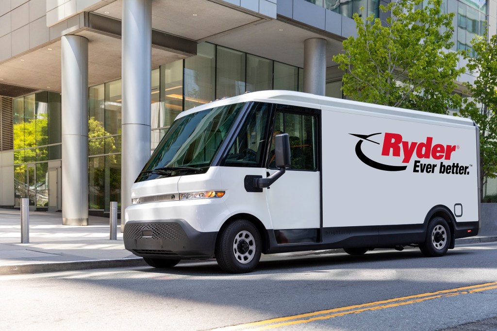 white electric delivery van on street with Ryder logo