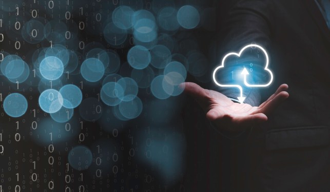 Smart cloud in the palm of a person's hand.