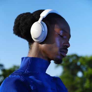 person wearing Bose QuietComfort Ultra Headphones