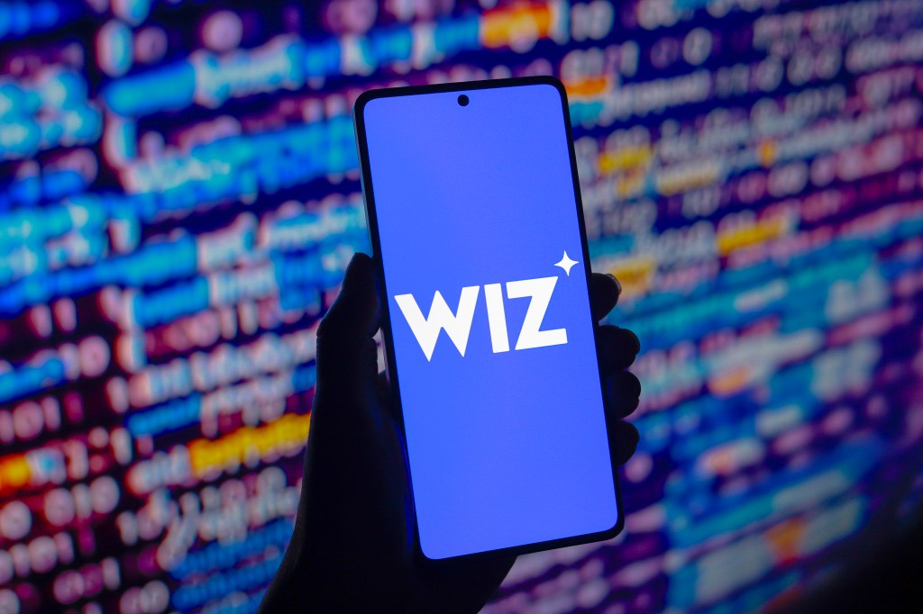 Wiz logo displayed on a smartphone