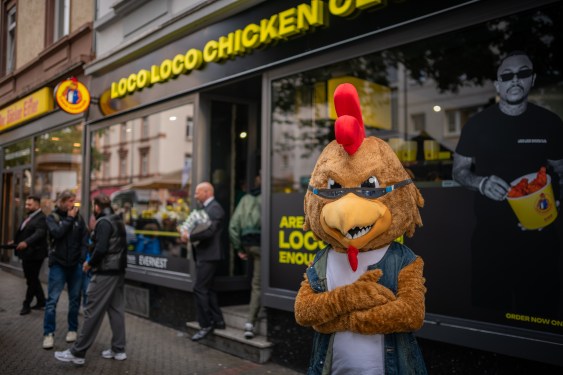 Loco Chicken mascot in front of store