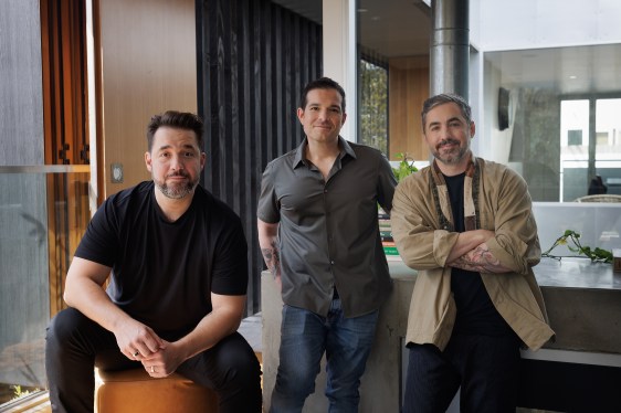 Alexis Ohanian, Justin Mezzell, Kevin Rose standing in an office