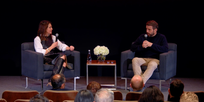 connie loizos and ryan peterson on stage talking