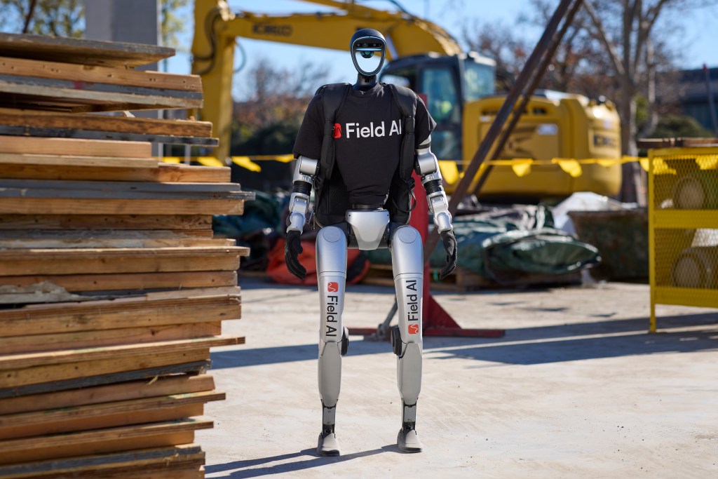 Image of a humanoid robot with FieldAI logos.