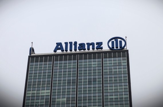 a photo of Allianz's logo at the top of a building.