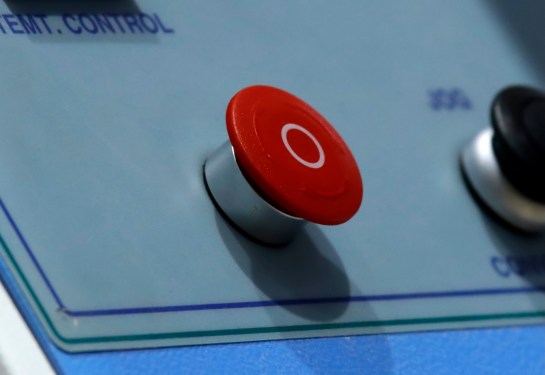 a photo of a red emergency stop button