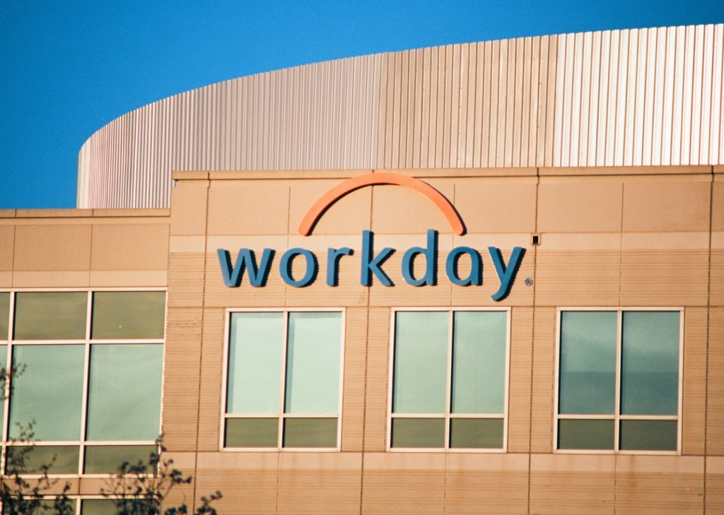 Close-up of sign and logo at headquarters of software company Workday in Pleasanton, California, March 26, 2018.
