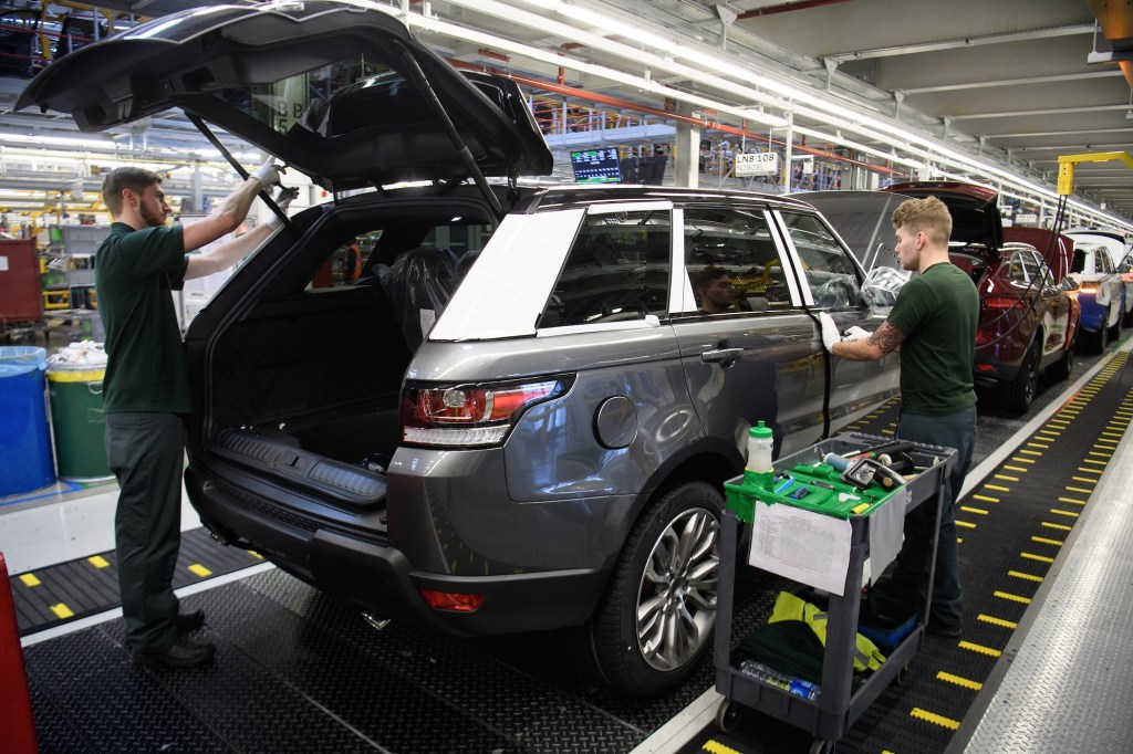 a photo of the Jaguar Land Rover vehicle production line at a factory in the U.K.